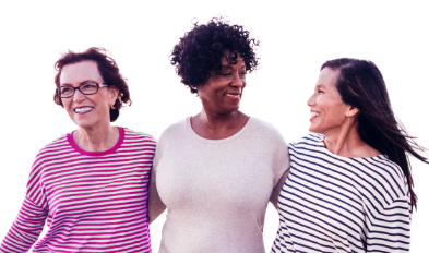 Three adult women smiling with arms behind each other